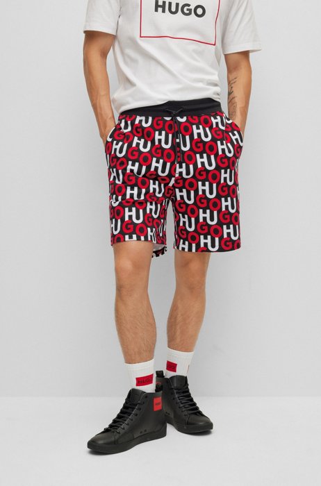 Organic-cotton shorts with all-over stacked logos, Red Patterned