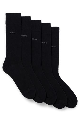 Juego de 5 pares de calcetines negros y blancos lisos.
