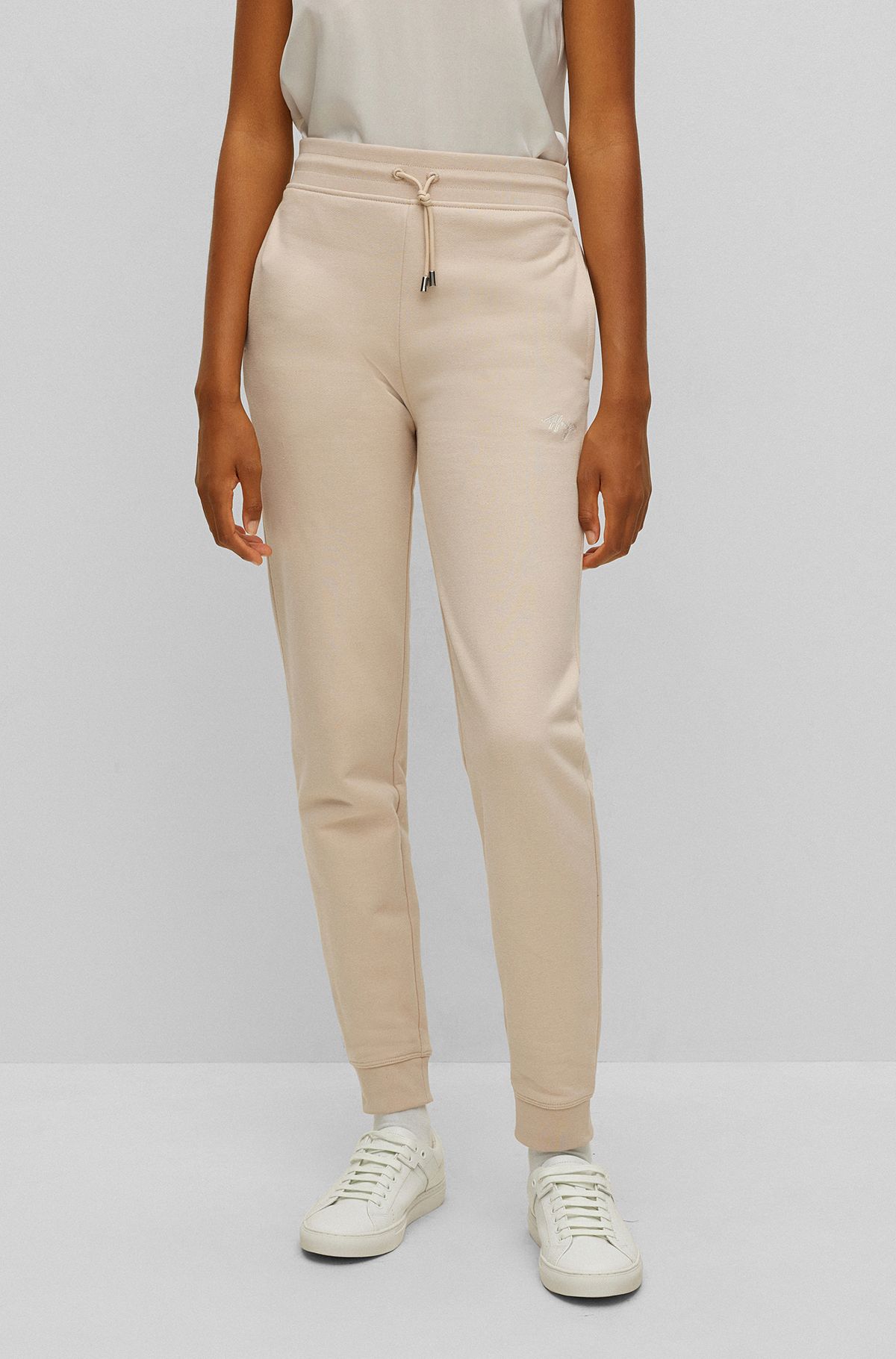 Cuffed cotton-terry tracksuit bottoms with logo embroidery, Light Beige