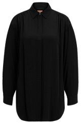 Langere relaxed-fit blouse met verdekte sluiting, Zwart
