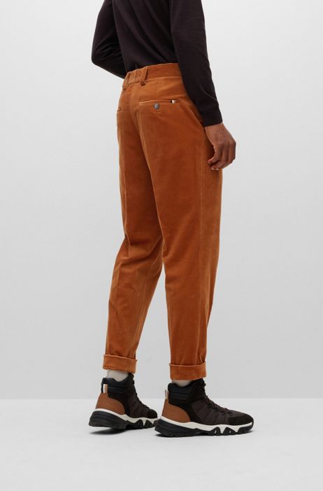 Pantaloni con fit affusolato in velluto a coste di cotone elasticizzato HUGO BOSS Uomo Abbigliamento Pantaloni e jeans Pantaloni Pantaloni in velluto 