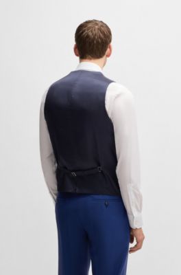 Slim fit-v&auml;st i stretchig ull, M&ouml;rkbl&aring;