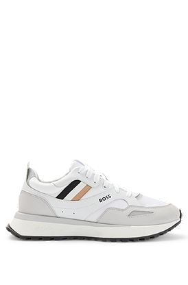 Mixed-material trainers with signature stripe
