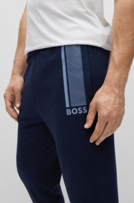 BOSS - Pantalones de chándal en felpa de rizo de con logo y rayas