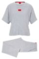 Relaxed-fit terry pyjama set with red logo labels, Grey