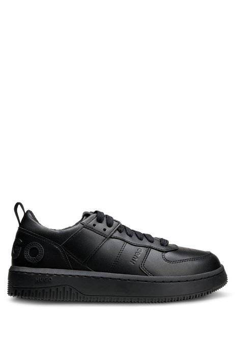 Low-top trainers with textured logo, Black