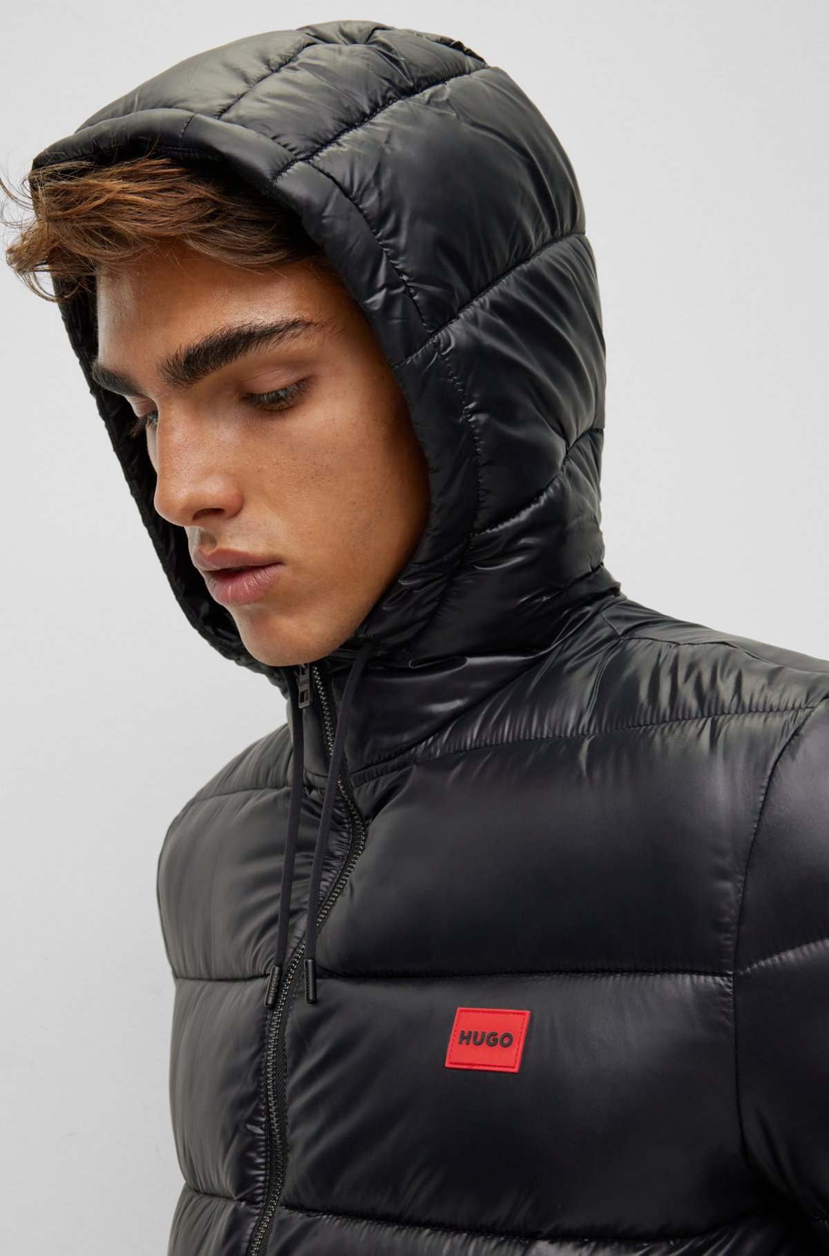 HUGO - Water-repellent puffer jacket with red logo label