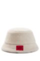 Bucket hat in teddy fleece with red logo label, White