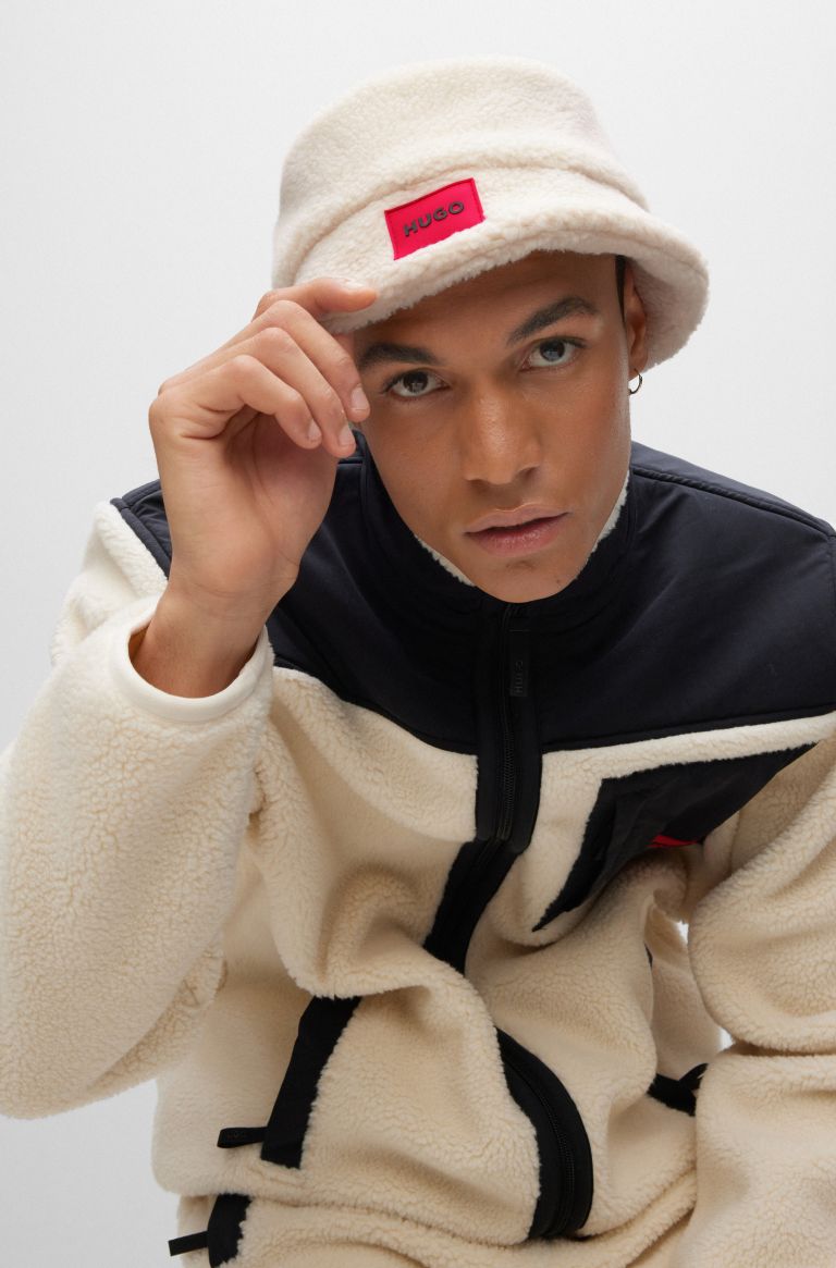 HUGO - Bucket hat in teddy fleece with red logo label