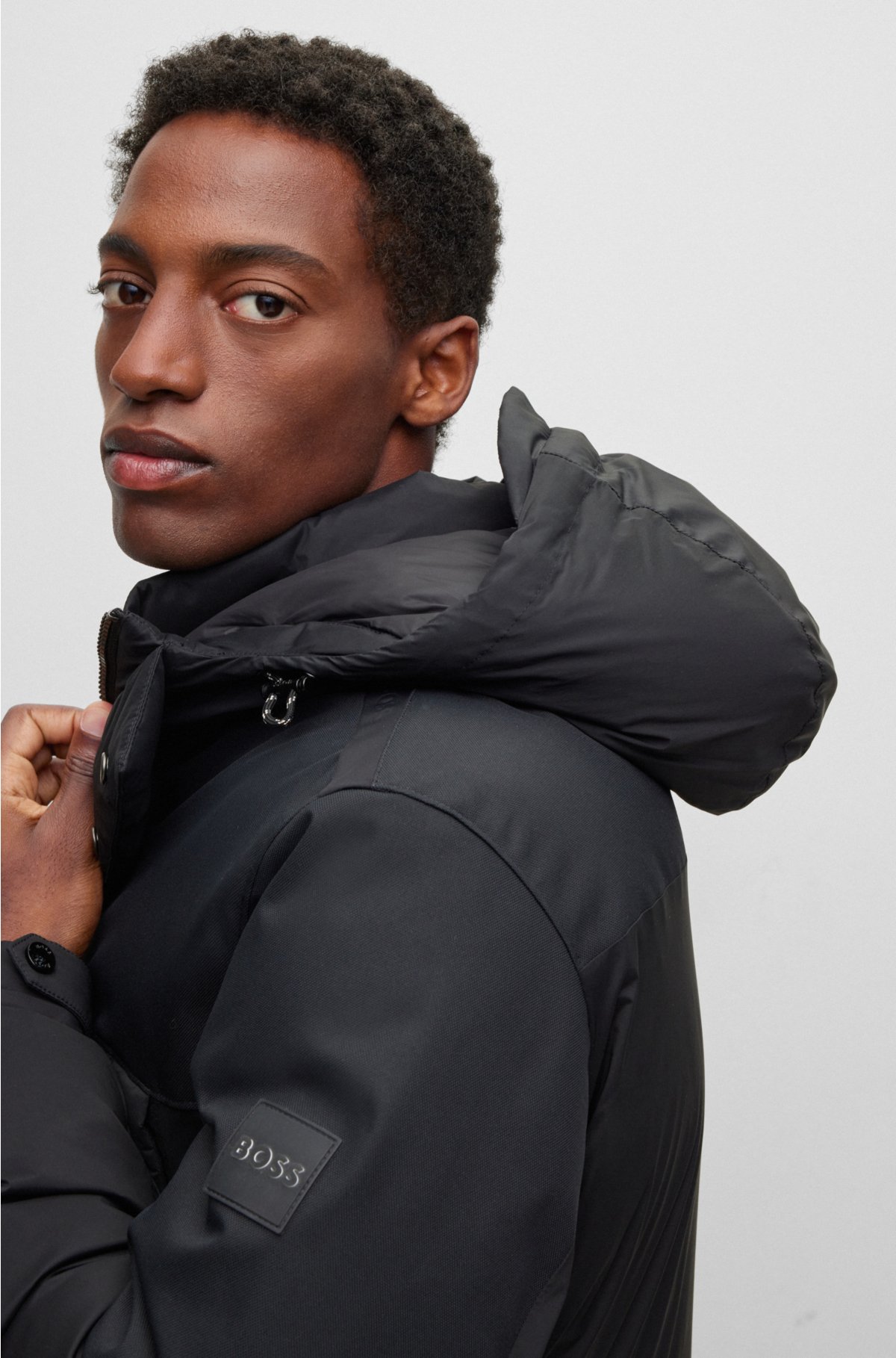 BOSS - Mixed-material hooded jacket with water-repellent finish