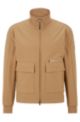 Water-repellent softshell jacket with logo patch, Beige