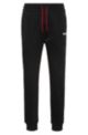 Cotton-blend tracksuit bottoms with stripe and logo, Black