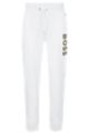 Cotton-terry tracksuit bottoms with monogram-filled logo, White