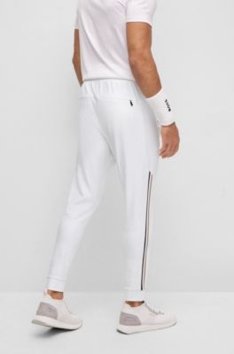 Hugo Boss BOSS x Matteo Berrettini logo tracksuit bottoms with signature stripes and cuffed hems. 3