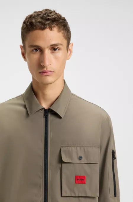 Zip-up cotton-blend canvas overshirt with logo label