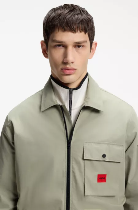 Zip-up cotton-blend canvas overshirt with logo label