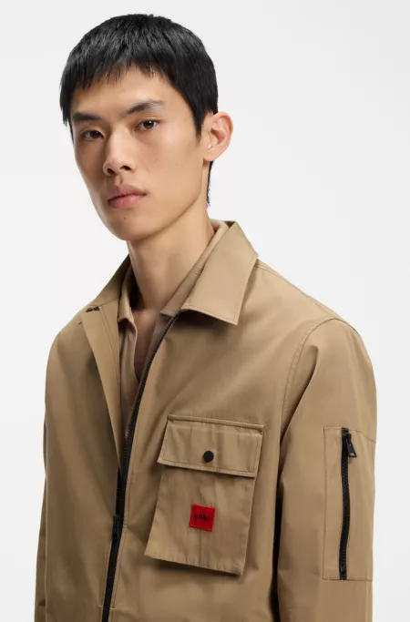 Surchemise zippée en toile de coton mélangé avec étiquette logo
