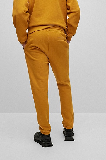HUGO 雨果堆叠风徽标图案棉质束口运动裤,  221_Rust/Copper