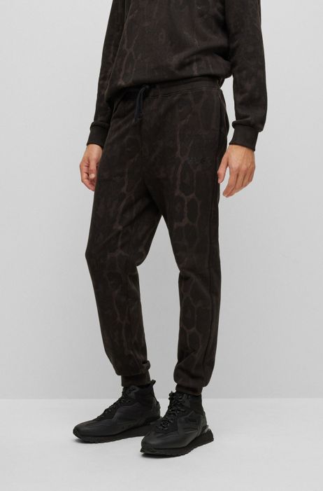 HUGO BOSS Homme Vêtements Pantalons & Jeans Pantalons Joggings Bas de survêtement en molleton de coton à motif jaglion 