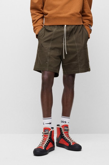 BOSS x PHIPPS cotton shorts made from recrafted leftover garments, Dark Green