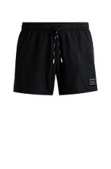 Fully lined swim shorts in quick-drying recycled fabric, Black