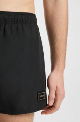 Swim shorts with metal logo and branding, Black