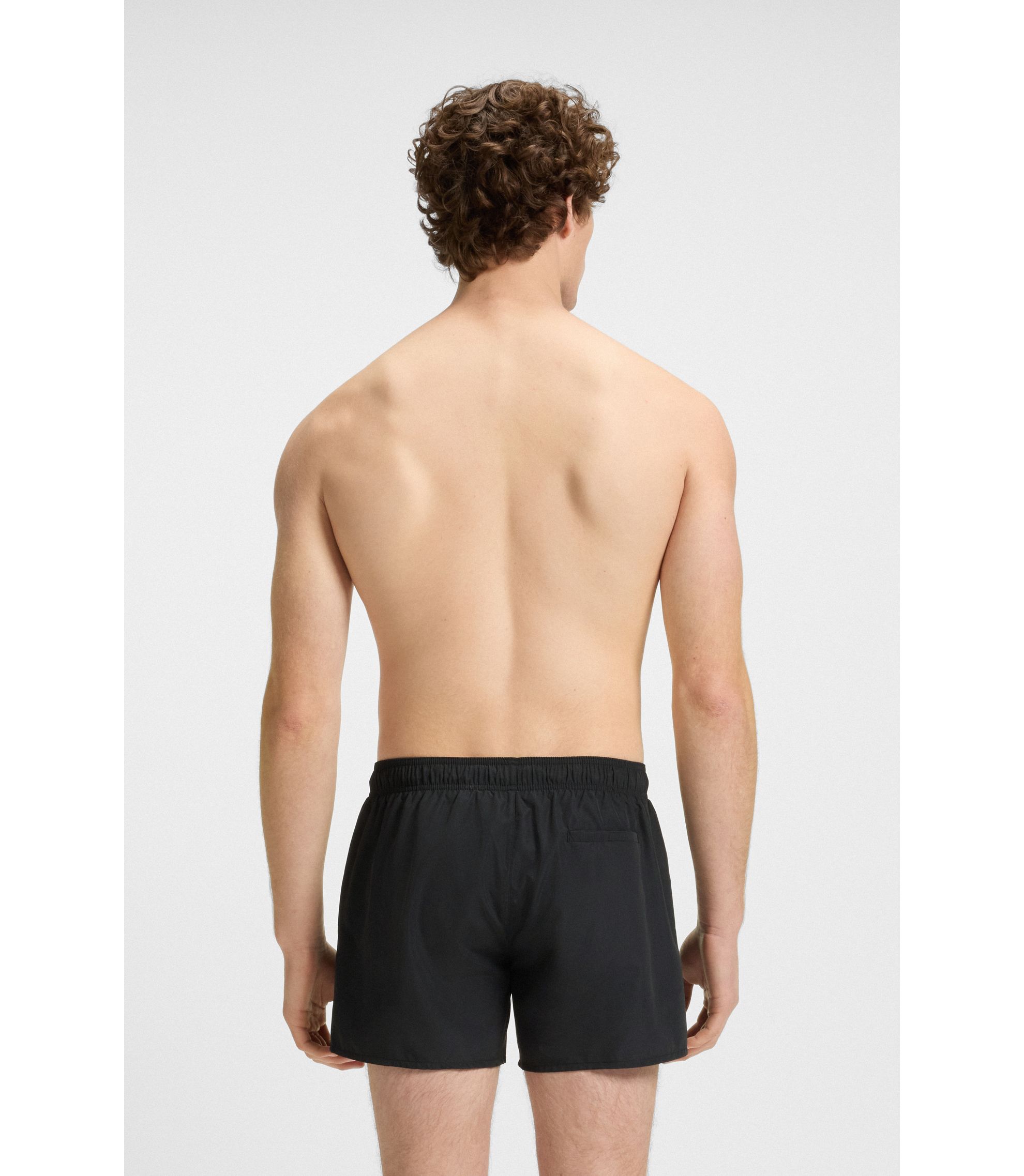 HUGO - Swim shorts with metal logo and branding - Black
