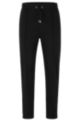 Cotton-blend tracksuit bottoms with gold-tone piping, Black