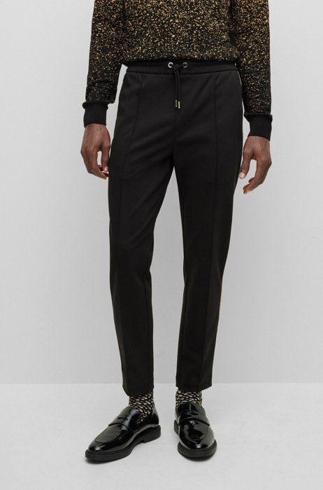 Cotton-blend tracksuit bottoms with gold-tone piping, Black