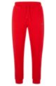Cotton-blend tracksuit bottoms with rhinestone details, Red