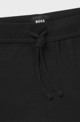 Cotton-blend pyjama bottoms with embroidered logo, Black