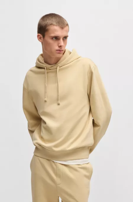 Cotton-terry relaxed-fit hoodie with logo print
