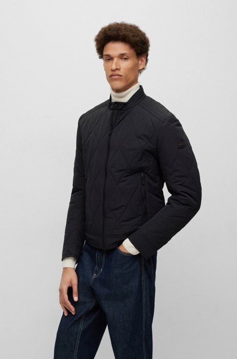 Waterafstotende gewatteerde jas met logopatch, Zwart