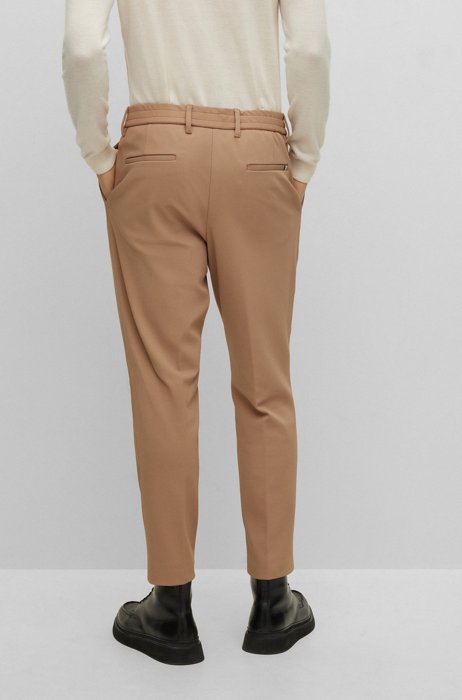 BOSS X FC Bayern relaxed-fit trousers with signature-stripe drawcord, Beige