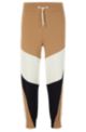 Cotton-terry tracksuit bottoms with color-blocking and logo, Beige