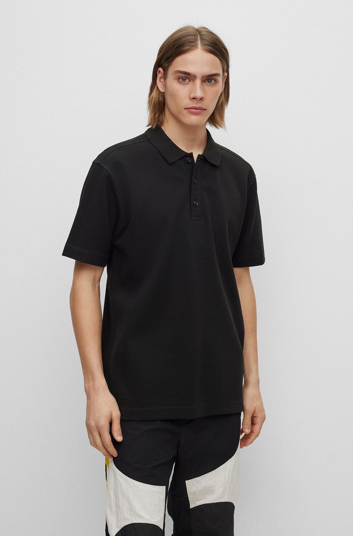Relaxed-fit cotton-blend polo shirt with waffle structure, Black