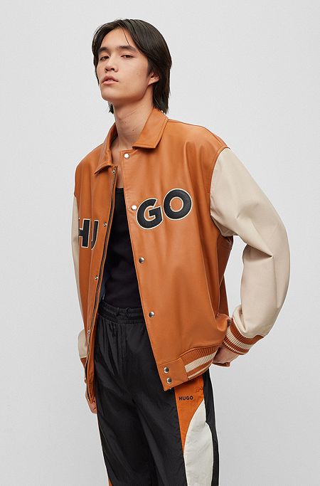 Colour-blocked logo varsity jacket in leather, Orange