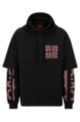 Cotton-terry layered-effect hoodie with graffiti-style logos, Black
