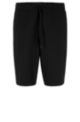 Slim-fit shorts in water-repellent stretch poplin, Black