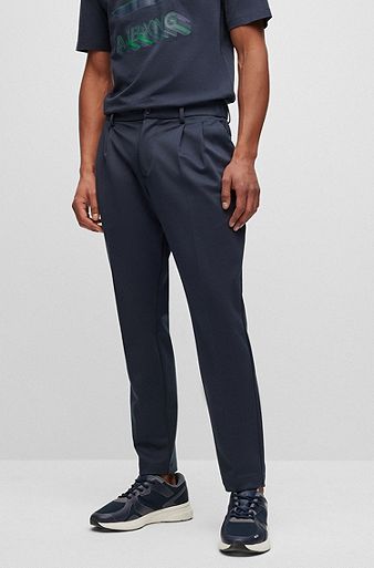 BOSS x AJBXNG tapered-fit trousers in stretch jersey with front pleats, Dark Blue