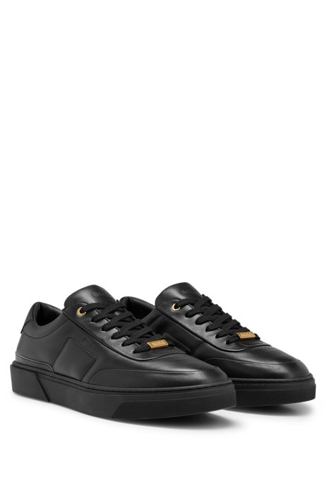 Leather trainers with gold-tone branded lace loop, Black