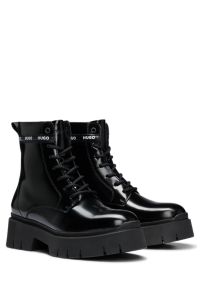 Calf boots in leather with logo-tape trim, Black