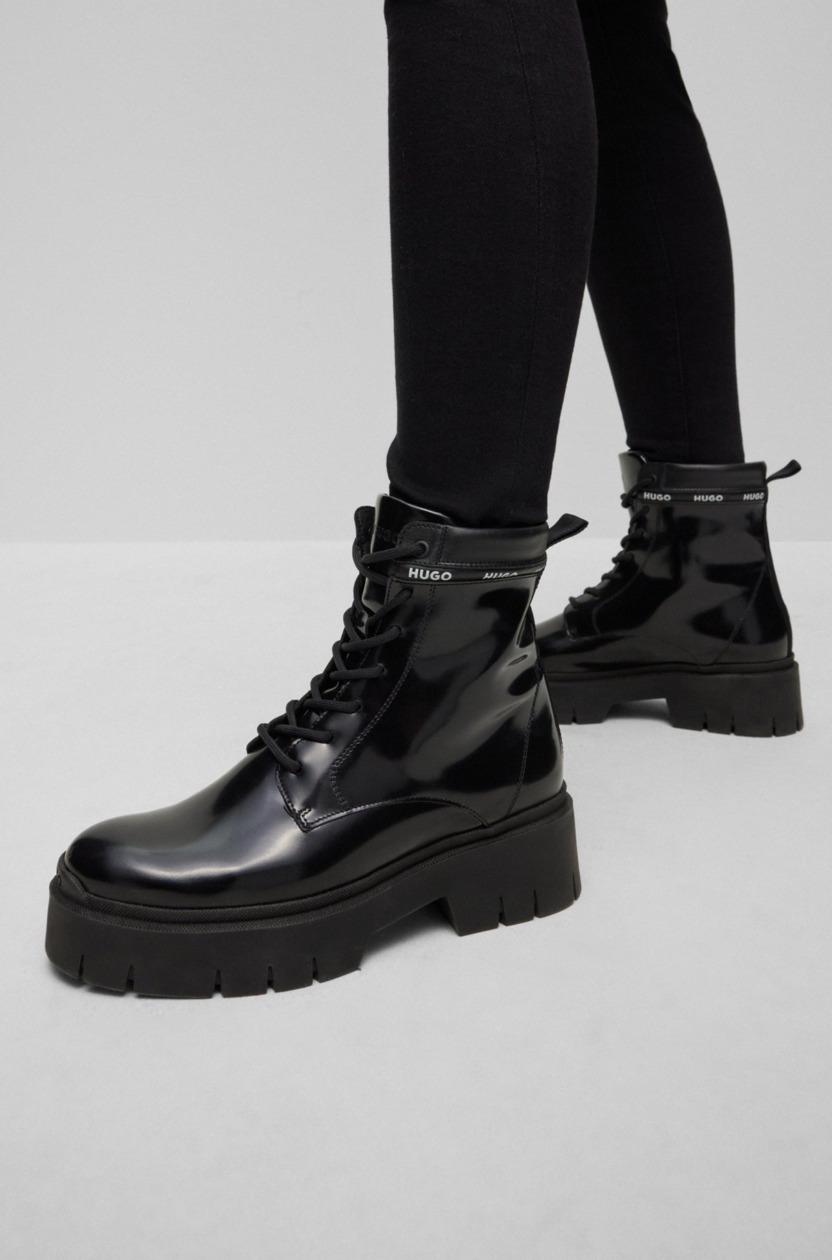 Calf boots in leather with logo-tape trim, Black