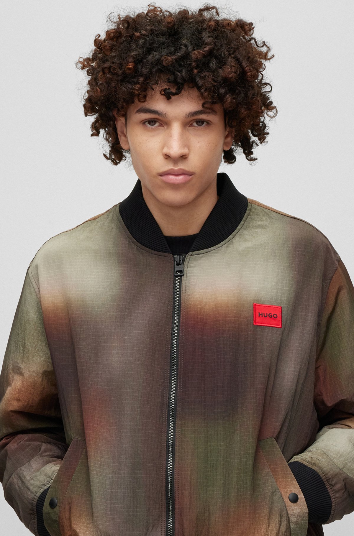 Oversized-fit padded bomber jacket with camouflage print, Patterned