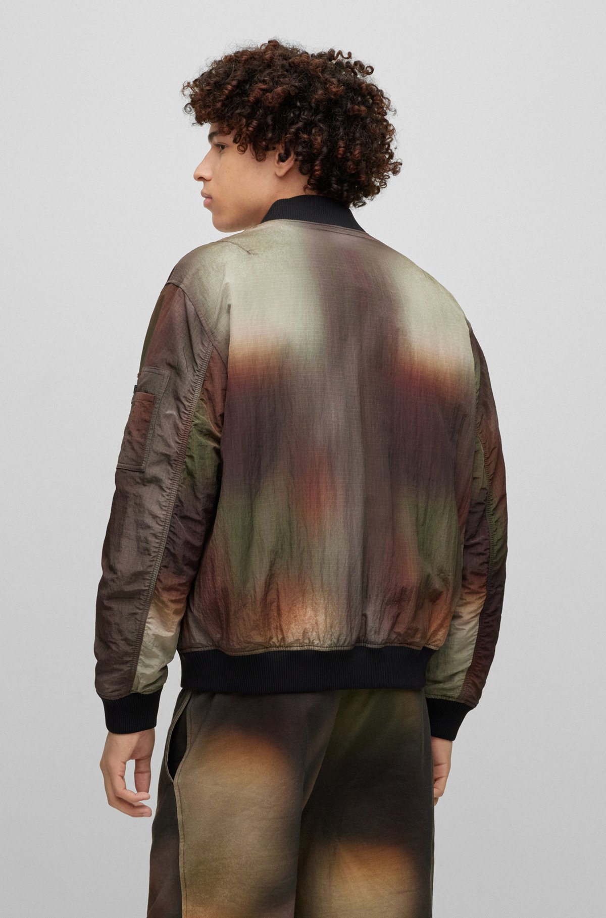 Oversized-fit padded bomber jacket with camouflage print, Patterned