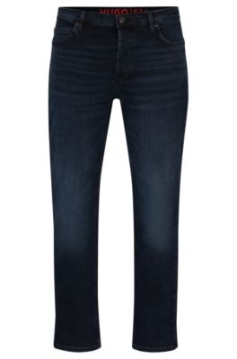 HUGO - Tapered-fit jeans in blue-black denim