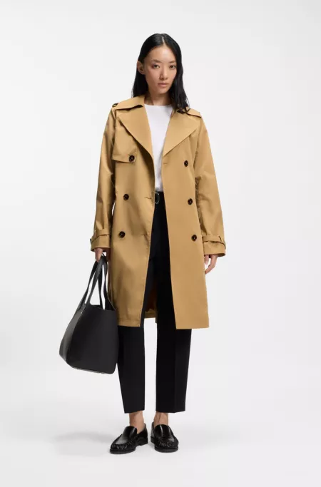 Double-breasted trench coat with buckled belt