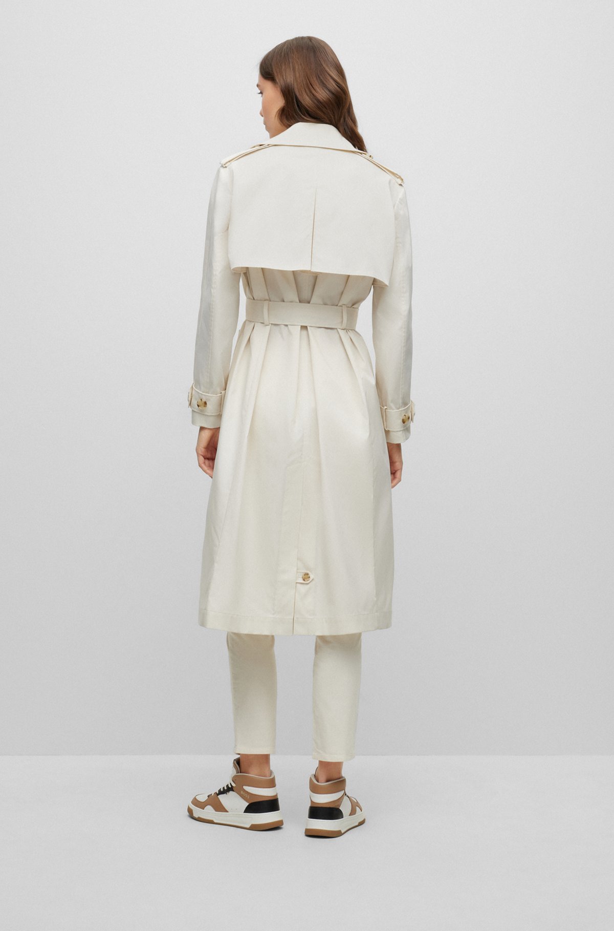 Double-breasted trench coat with belted closure, White