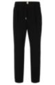 Relaxed-fit trousers with drawstring waist in stretch material, Black