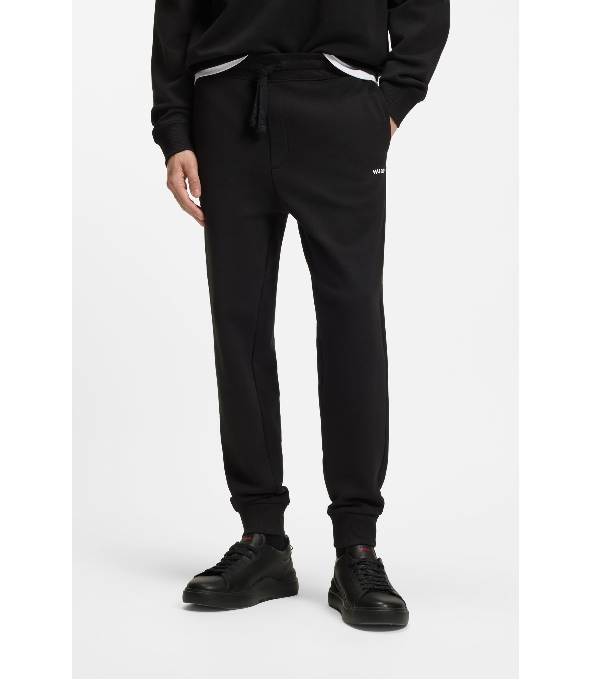 Jogginghose aus Baumwoll-Terry mit kontrastfarbenem Logo